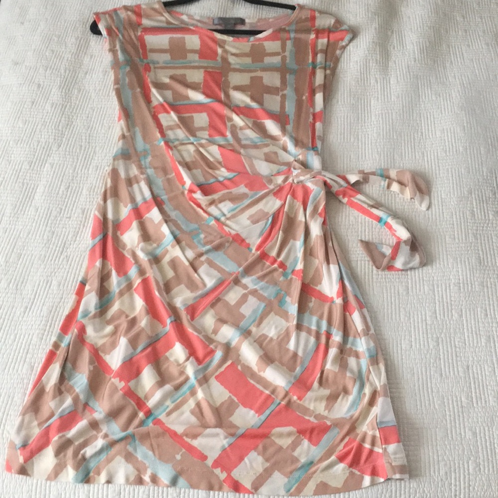 Pretty coral and tan dress with side tie.